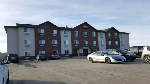CAPRI INN SUITES AMERICAN OWNED AND OPERATED — Property
