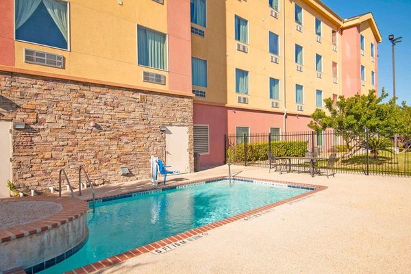 Days Inn Suites by Wyndham San Antonio Near Frost Bank Center — Property