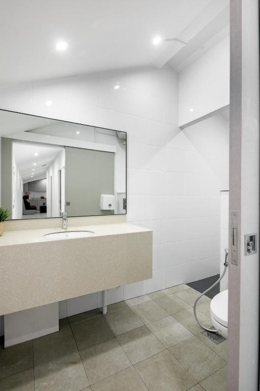 Circular House Capsule Hotel — Bathroom