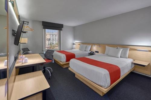 City Express Suites By Marriott Tijuana Rio — Guest room