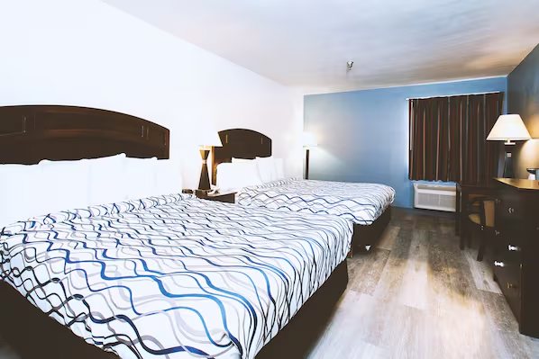 Coratel Inn Suites By Jasper Wesley Hospital — Guest room