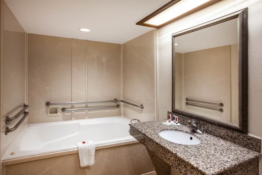Days Inn Suites by Wyndham Cleburne TX — Bathroom