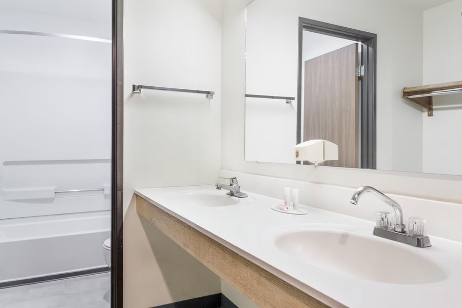 Days Inn Suites by Wyndham Logan — Bathroom