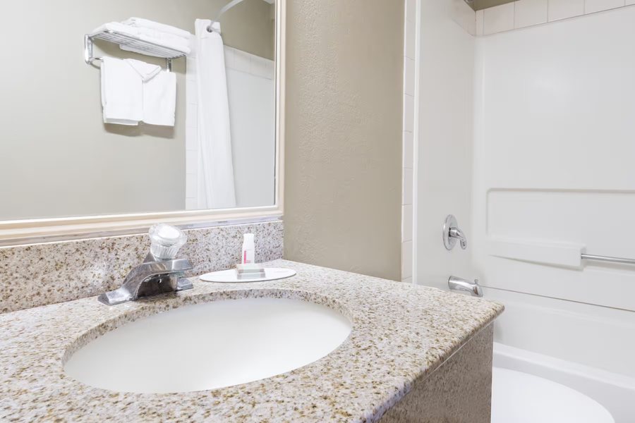 Endeavor Inn Suites Trademark Collection by Wyndham — Bathroom