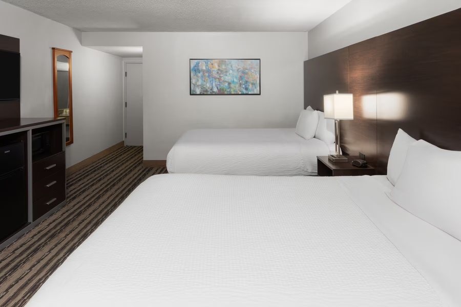 Endeavor Inn Suites Trademark Collection by Wyndham — Guest room