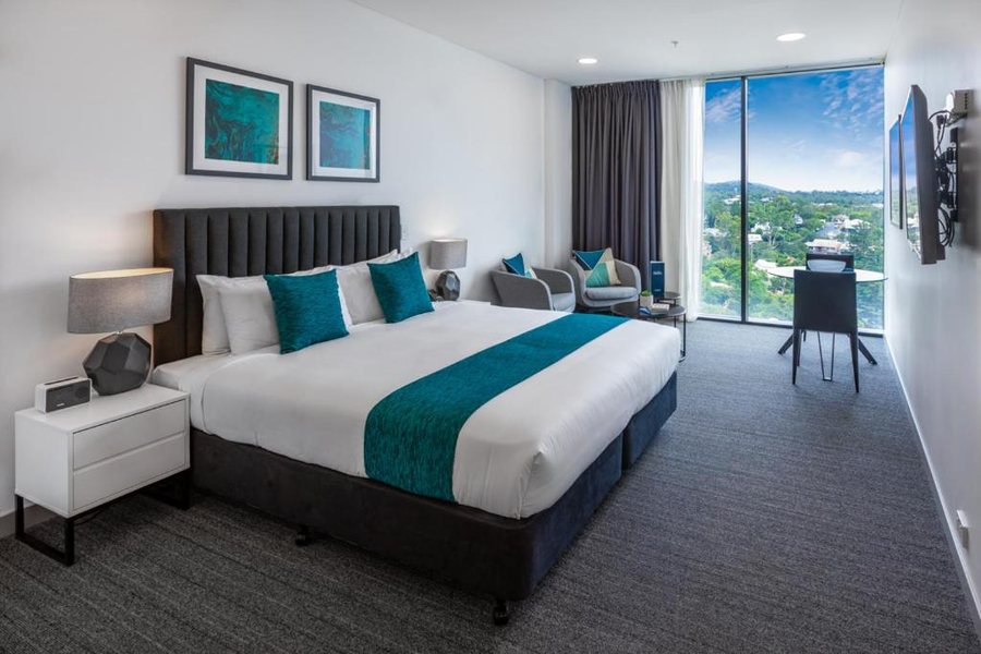 Essence Suites Taringa — Guest room
