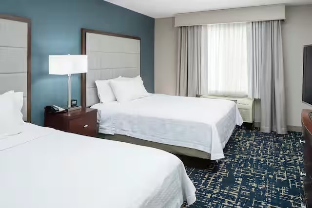 Garden Inn and Suites — Guest room