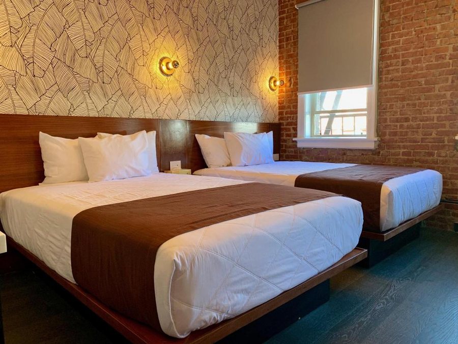 H By H Hospitality — Guest room