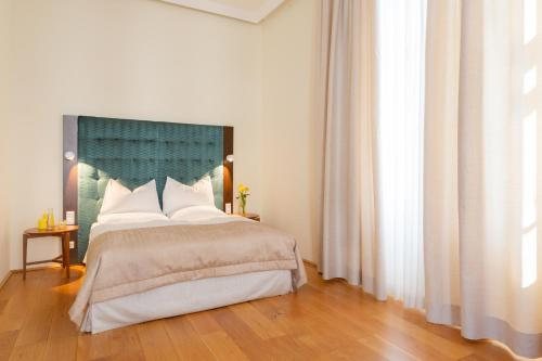 HiLight Suites Hotel — Guest room