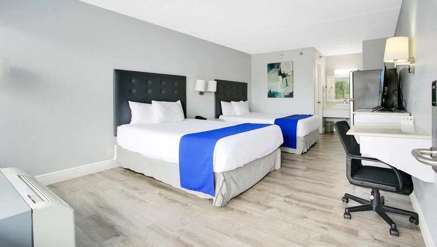 Home 1 Suites Extended Stay Kissimmee — Guest room