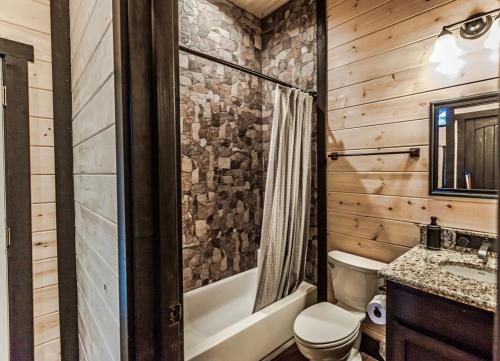 Knotty And Nice Cabins Inc — Bathroom