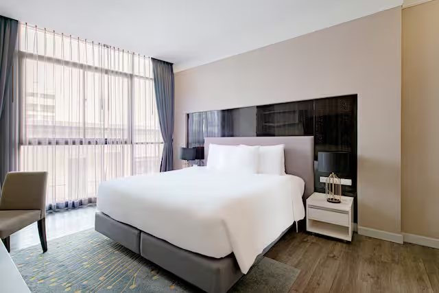 Metropolis Suites Tapestry Collection By Hilton — Guest room