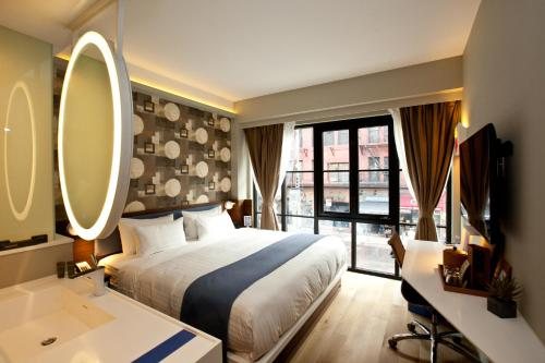 NobleDEN Hotel — Guest room