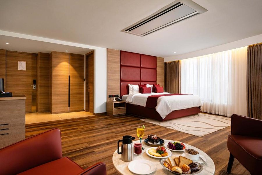 Oshin Calicut — Guest room