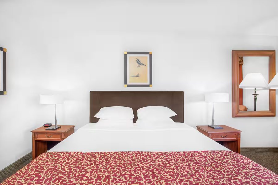 Ramada by Wyndham Barstow — Guest room
