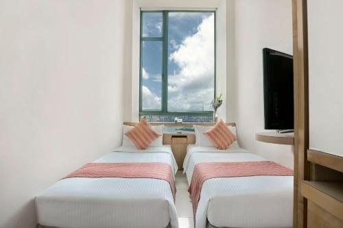 Rambler Garden Hotel — Guest room