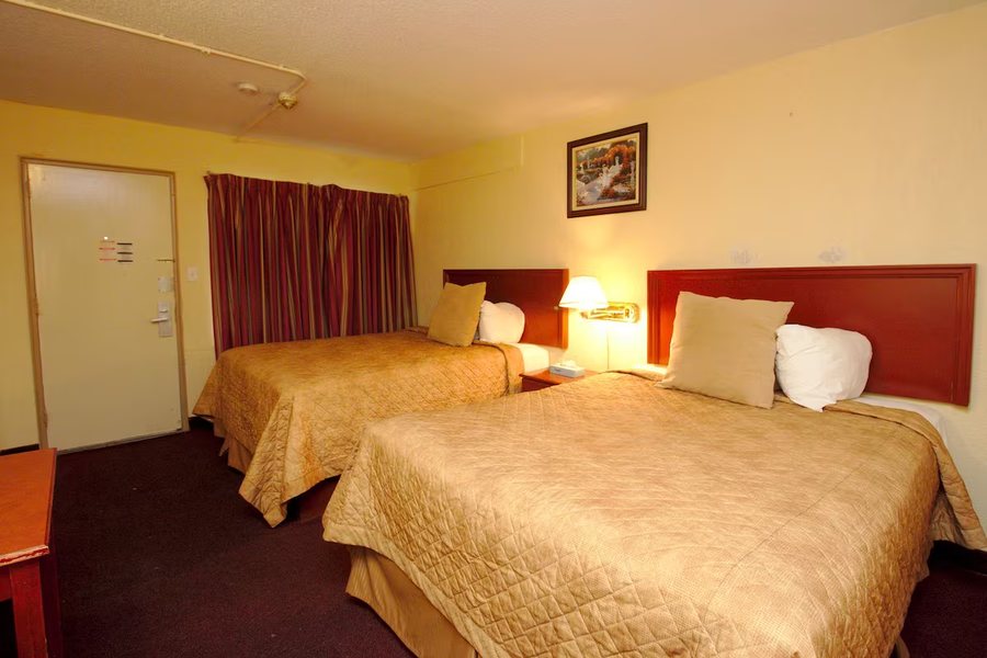 Swiss Cottage Inns — Guest room