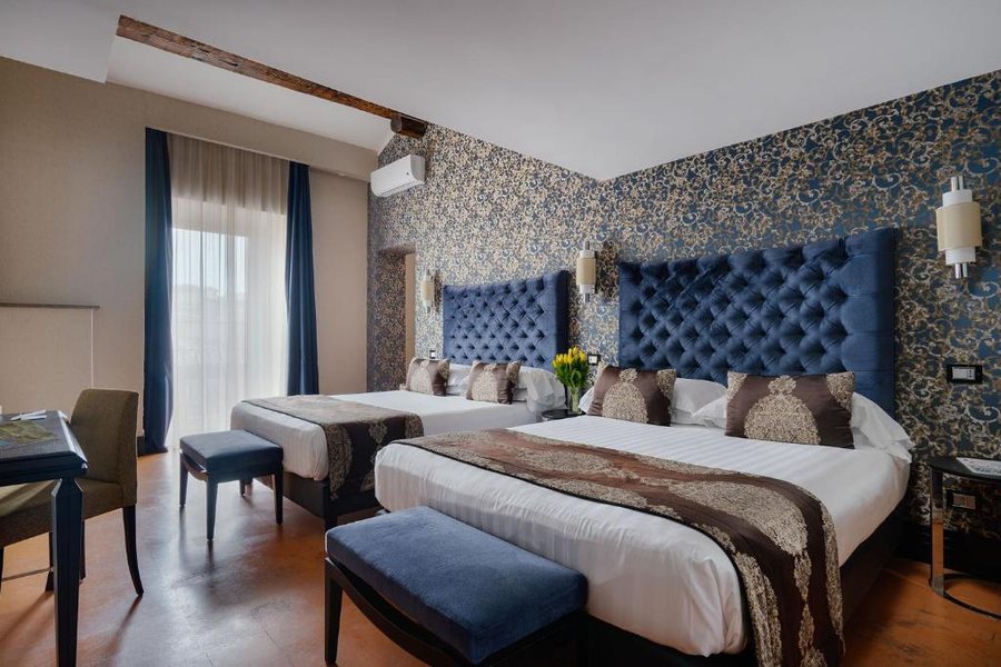 Unica Suites — Guest room