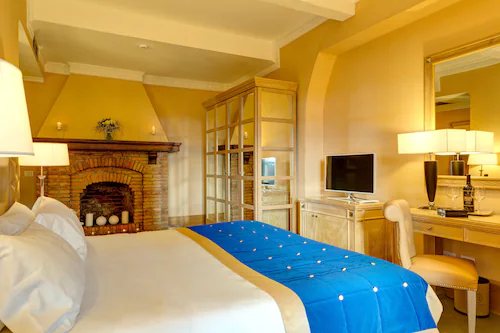 Villa Tolomei Hotel Resort — Guest room