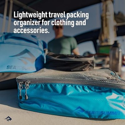 Sea to Summit Garment Mesh Bag Packing Organizer, Small, Atoll Blue | Lightweight nylon and mesh packing organizer compartmentalizes clothing and accessories in a suitcase or duffle