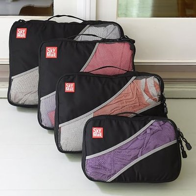 SkyMall Packing Cubes Travel Bags. Luggage Organizer Accessories. 4 Piece Value Set. Durable Nylon & Breathable Mesh Panels. Bonus Promotional Shoe Bag.