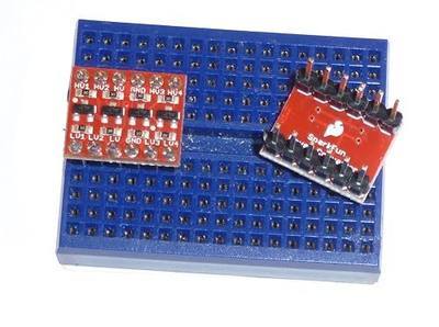 SparkFun Logic Level Converter - Bi-Directional | Step down 5V signals to 3.3V AND steps up 3.3V to 5V Board Dimensions: 0.63 x 0.52" (16.05 x 13.33mm)