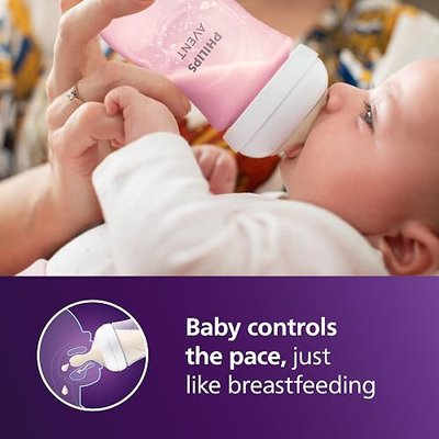 Philips Avent Natural Response Baby Gift Set - 3X 4oz Pink Bottles with Slow Flow Nipples (Flow 2), 1x 9oz Pink Bottle with Medium Flow Nipples (Flow 3), 2X Soothie Pacifiers 0-3m, SCD838/03