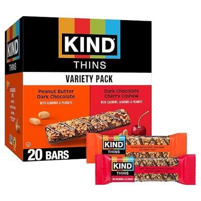 KIND Thins Snack Bars Variety Pack, Gluten Free, Low Calorie, Healthy Snacks, Peanut Butter Dark Chocolate, Dark Chocolate Cherry Cashew, 4-5g Sugar, 20 Count | A light, 90-calorie morning snack with 4-5g sugar. These thin, crunchy, non-GMO, gluten-free nut bars include 20 per pack.