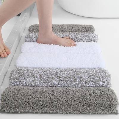 XIYUNTE Shaggy Bathroom Rugs 24x16, Extra Thick 2000GSM Non Slip Bath Mat with Drain Groove Rubber Backing, Washable Quick Dry Absorbent Microfiber Bath Rugs for Bathroom Floor Tub Shower, Gray White