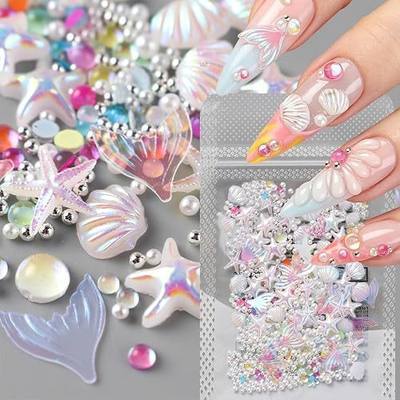 600PCS 3D Aurora Ocean Rhinestones Nail Charms Mixed Resin Starfish Shells Nails Rhinestones Silver Beads Pearl Nail Gems Colorful Bubble Beads Nail Diamonds for Summer Beach Women DIY Manicure Decor